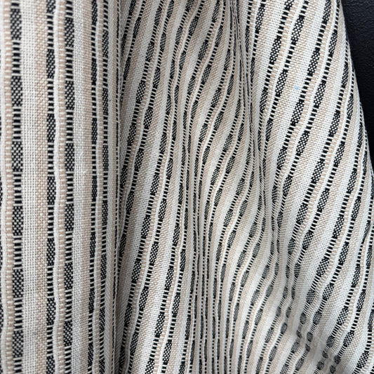The Heritage Stripe Collection Jacquard Tapestry in Light Fawn and Black, showcasing its textured hand-loomed design, ideal for upholstery and home decor projects.