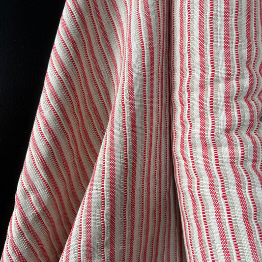 The Heritage Stripe Collection Jacquard Tapestry in red, light fawn, and natural colors showcasing its textured hand-loomed feel and artisanal character, perfect for upholstery, bags, and home decor.