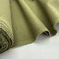 Linen + Viscose + Poly Mix fabric in Spring Green, showcasing its soft texture and breathable qualities, ideal for dresses, blouses, and home decor.
