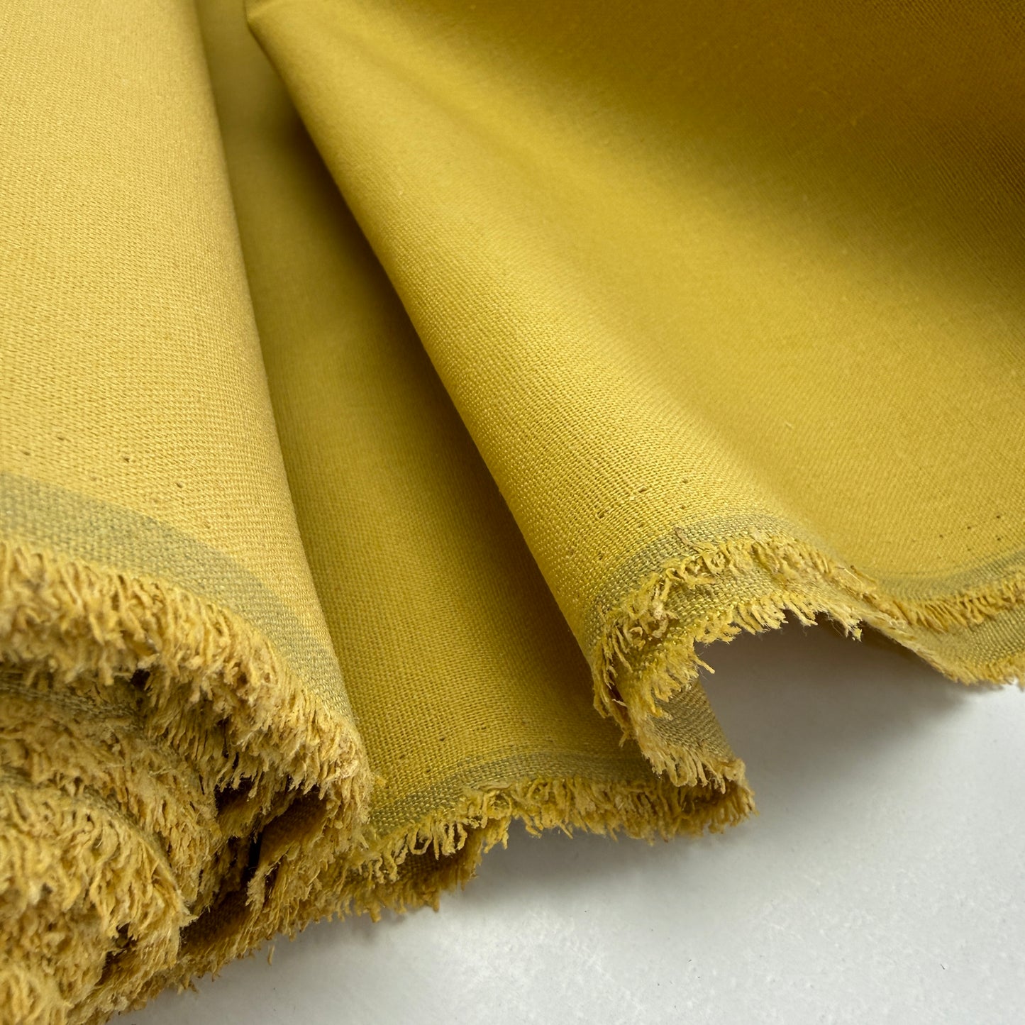 Linen + Viscose + Poly Mix - Harvest Gold fabric showcasing its soft texture and breathable quality, perfect for summer apparel and home decor projects.