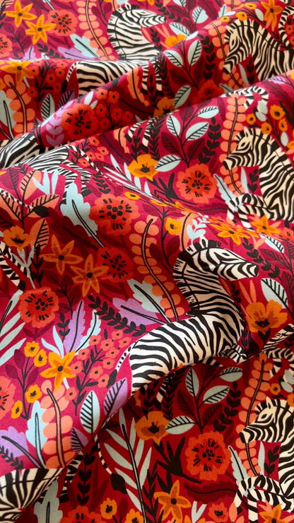 Frolicking Zebras Red - Zebras - Maria Galybina - Cloud 9 Fabrics - Poplin - Simplifi Fabric